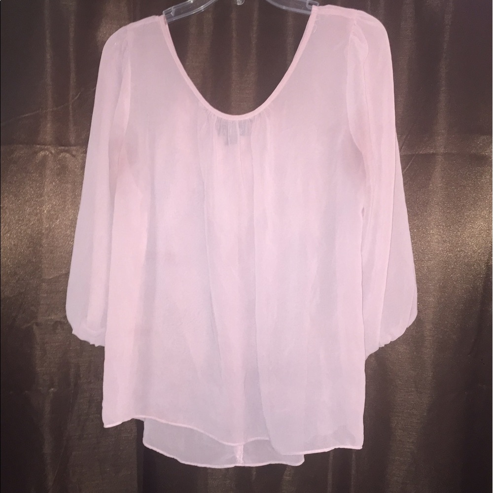 Pink blouse with bow on back